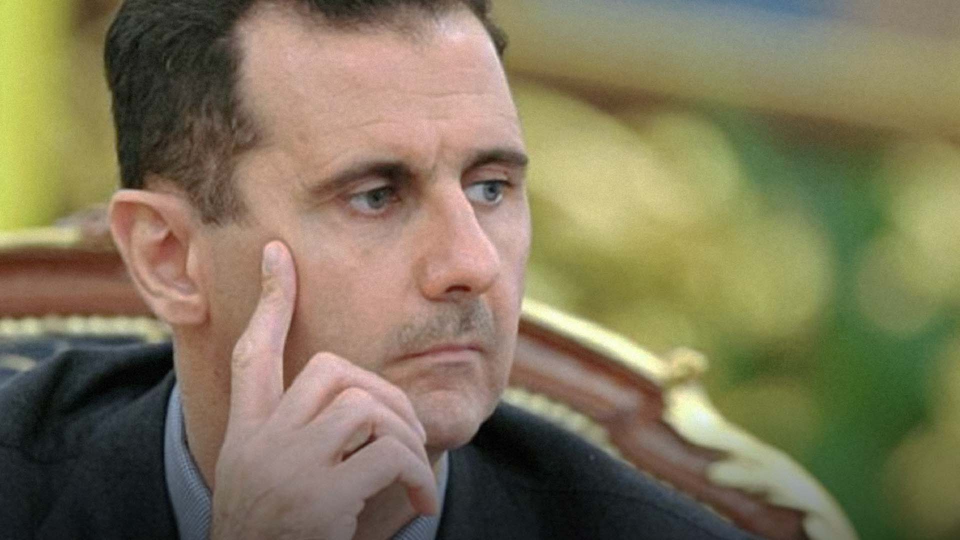 صورة الأسد يتحسّر لعدم قدرته على قصف المدنيين بمدفع رمضان