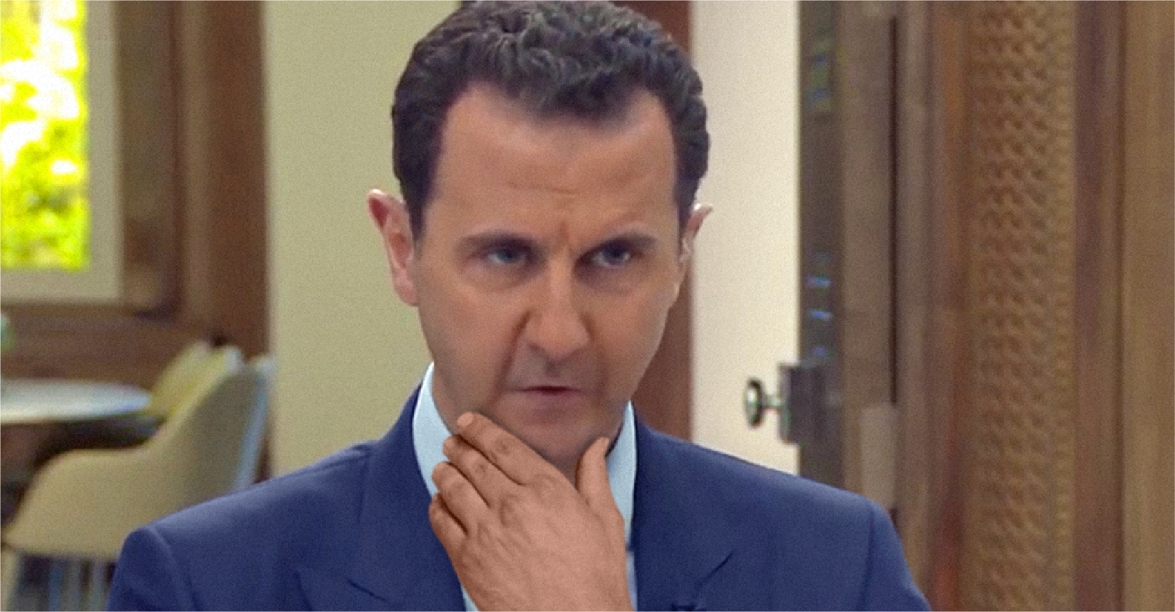 صورة الأسد يتعهد لإيران بسحق المندسين في صفوف المنتخب السوري